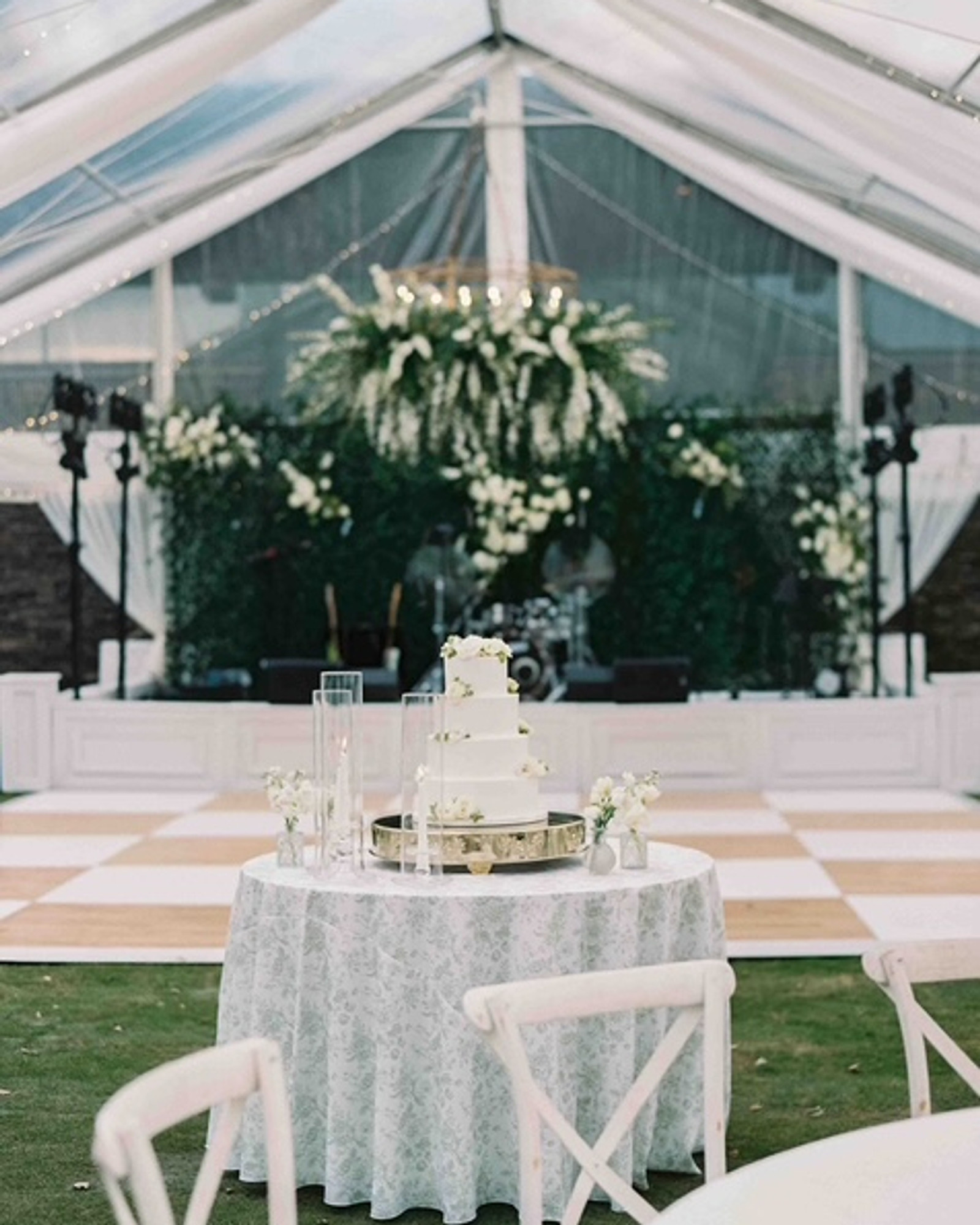 Tented reception with a tiered wedding cake