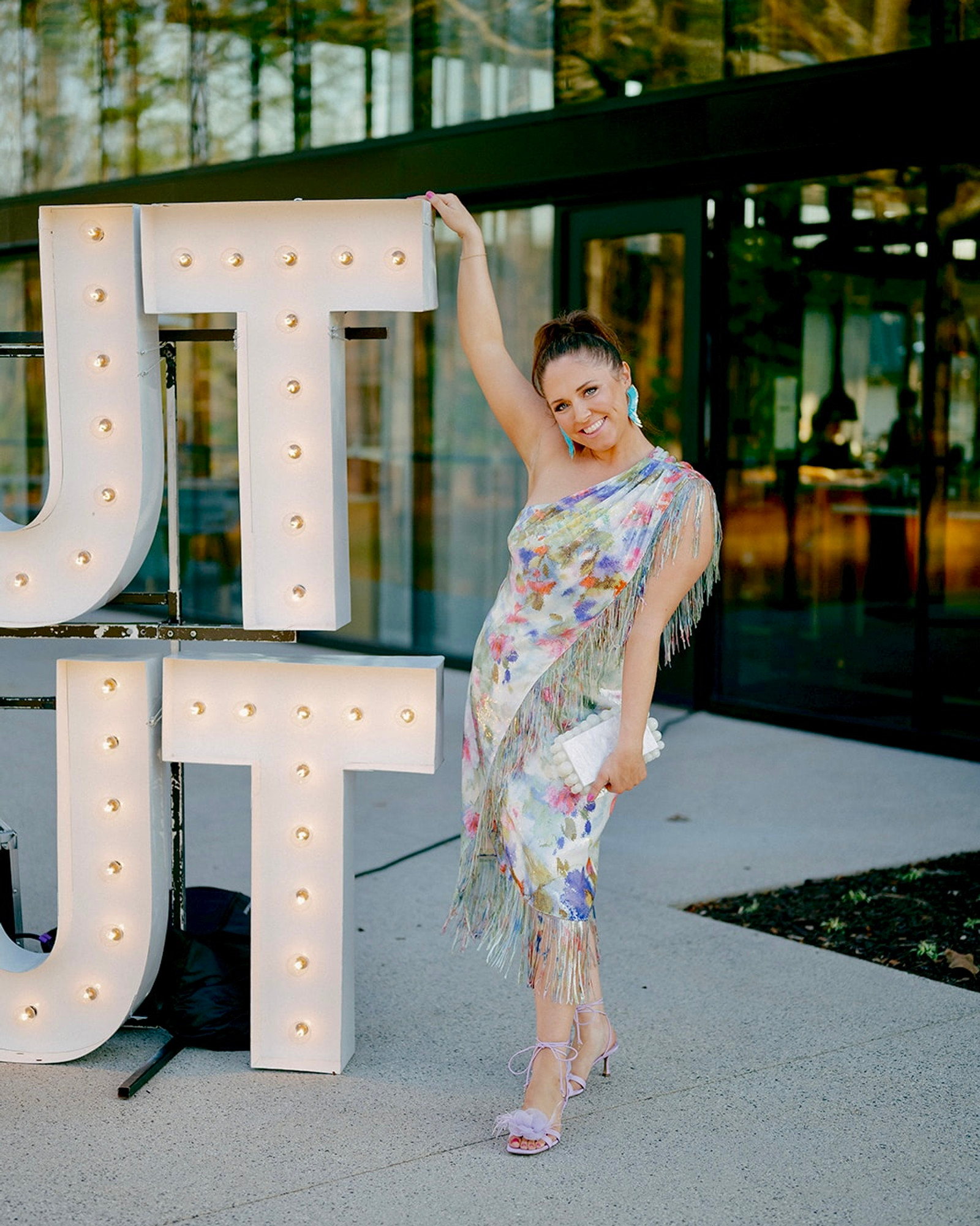 Celebration energy at illuminated marquee letters