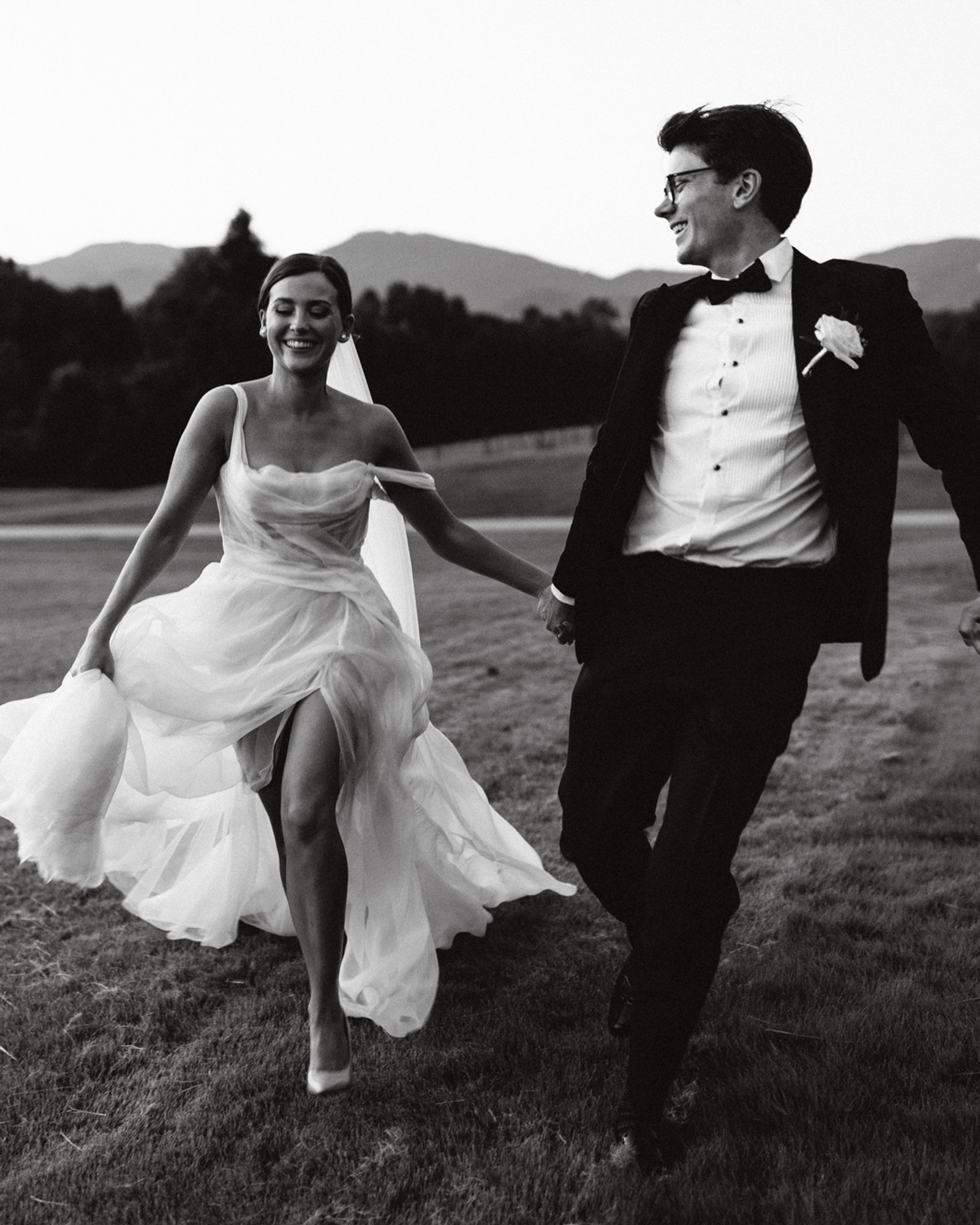 Editorial black-and-white portrait of the couple
